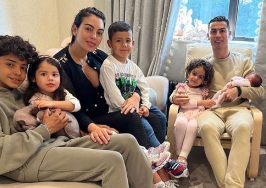 Eva Maria Dos Santos with her family after the arrival of her baby sister in April.